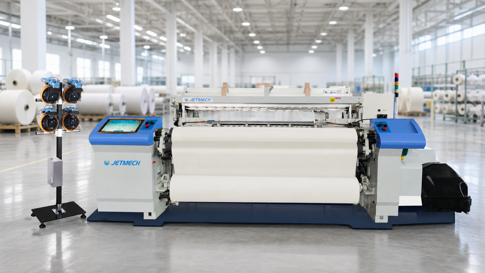 JETMECH air jet loom in a bright textile factory